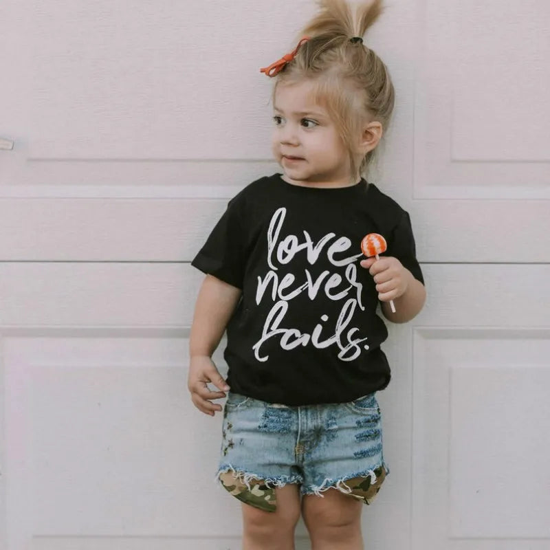 Love Never Fails Girls Heart Christian Shirt