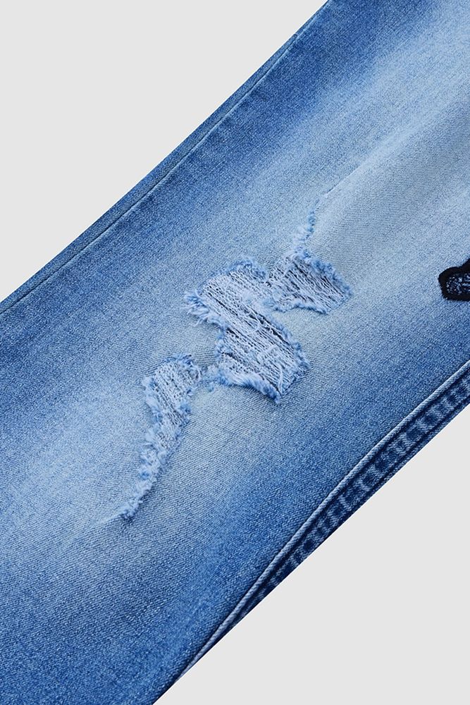 Cross Embroidery Ripped Low Rise Bootcut Jeans